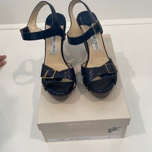 Jimmy Choo heels.  Black snakeskin scrappy sandals.